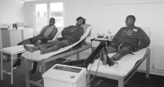  Chelsea players are looked after in the treatment room during a training session held in the 1993/94 season at Harlington, England. 