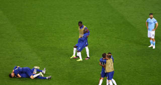 Chelsea players celebrate winning the Champions League following the UEFA Champions League Final between Manchester City and Chelsea FC at Estadio do Dragao on May 29, 2021 in Porto, Portugal. 