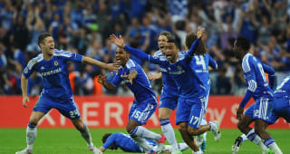  (L-R) Gary Cahill, Florent Malouda, Fernando Torres and Jose Bosingwa celebrate after Didier Drogba scored the winning penalty during UEFA Champions League Final between FC Bayern Munich and Chelsea at the Fussball Arena Munich on May 19, 2012 in Munich, Germany.  