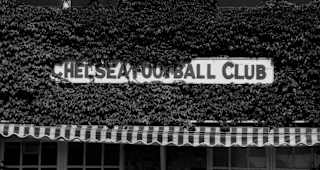 Signage below the first floor of the ivy-clad building which housed Chelsea FC's main offices in Stamford Bridge in 1977. 