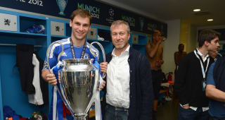  Roman Abramovich & Branislav Ivanovic celebrate in the dressing room after winning the UEFA Champions League Final between FC Bayern Munich and Chelsea on May 19, 2012 in Munich, Germany