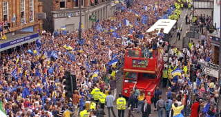 Chelsea players and fans celebrate victory during an open top bus parade celebrating the club winning the 1997 FA Cup Final between Chelsea and Middlesbrough 2-0 held on May 18, 2010 on the Fulham Road, in London. 