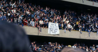 Chelsea fans celebrate promotion back to the First Division during the Football League Division 2 match between Chelsea and Hull City held on May 14, 1977 at Stamford Bridge. Chelsea won the match 4-0. 