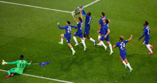 PORTO, PORTUGAL - MAY 29: Mason Mount, Kai Havertz and Antonio Ruediger run with the Champions League Trophy towards their fans following victory in the UEFA Champions League Final between Manchester City and Chelsea FC at Estadio do Dragao on May 29, 2021 in Porto, Portugal. 