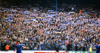 STAMFORD BRIDGE, MAY 3RD 1980 : Chelsea 3 v Oldham Athletic 0. Chelsea fans in The Shed celebrate during the game. Chelsea missed out on promotion to Division One on goal difference. 