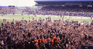 Saturday STAMFORD BRIDGE, MAY 3RD 1980 : Chelsea 3 v Oldham Athletic 0. Chelsea fans celebrate beneath the East Stand Directors Box after the game. Chelsea missed out on promotion to Division One on goal difference.