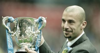 MARCH 29: Chelsea manager Gianluca Vialli celebrates with the trophy after his team won the Coca Cola League Cup Final against Middlesbrough at Wembley Stadium on March 29, 1998. 