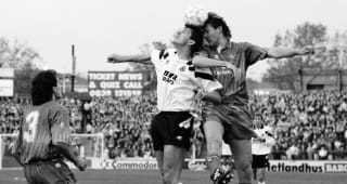  Tony Cascarino of Aston Villa (centre) and David Lee challenge for the ball during a Barclays League Division One match at Stamford Bridge on November 3, 1990. Tony Dorigo (left) watches on. 