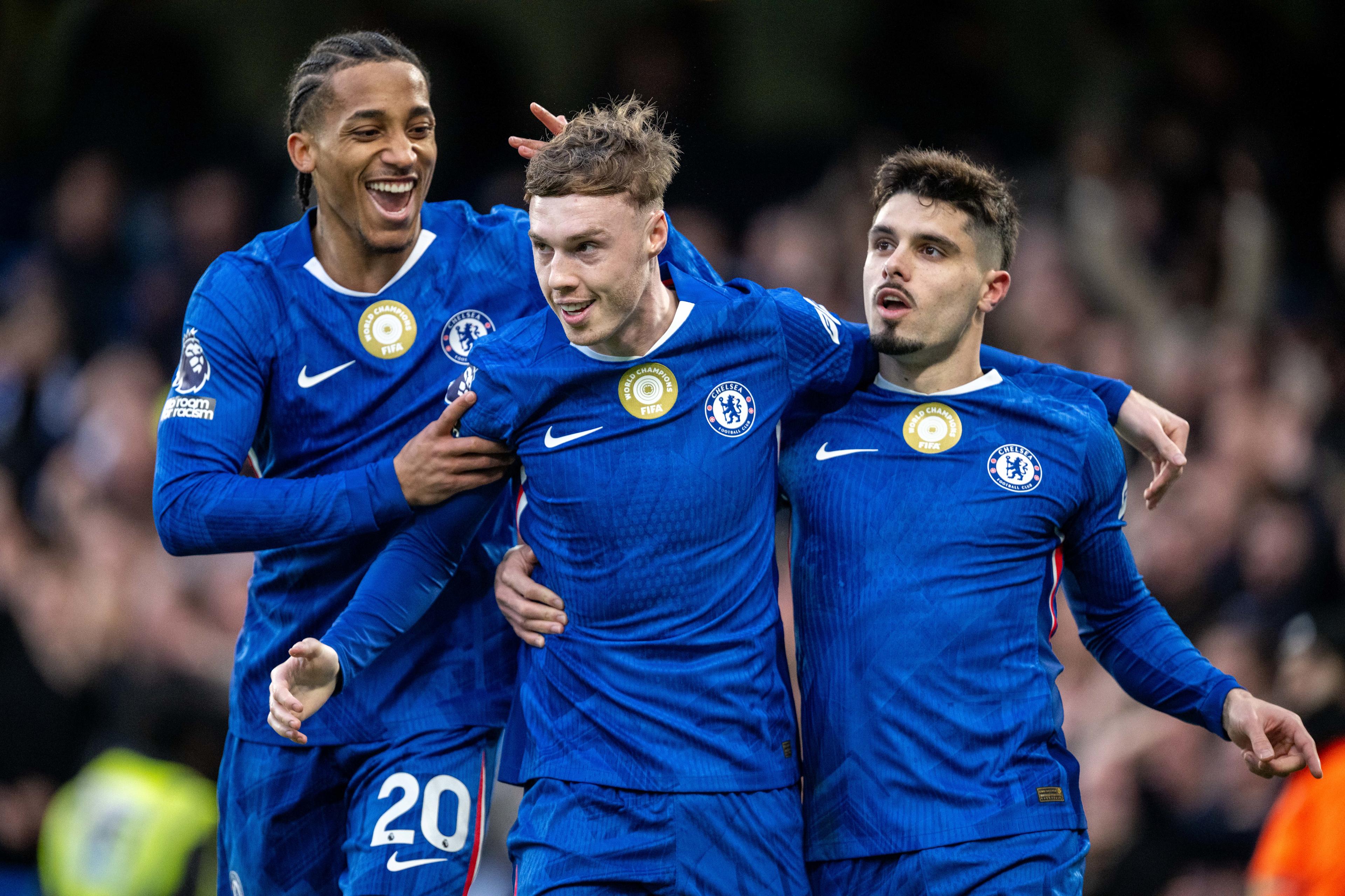 Cole Palmer celebrates a goal for Chelsea with Malo Gusto and teammates