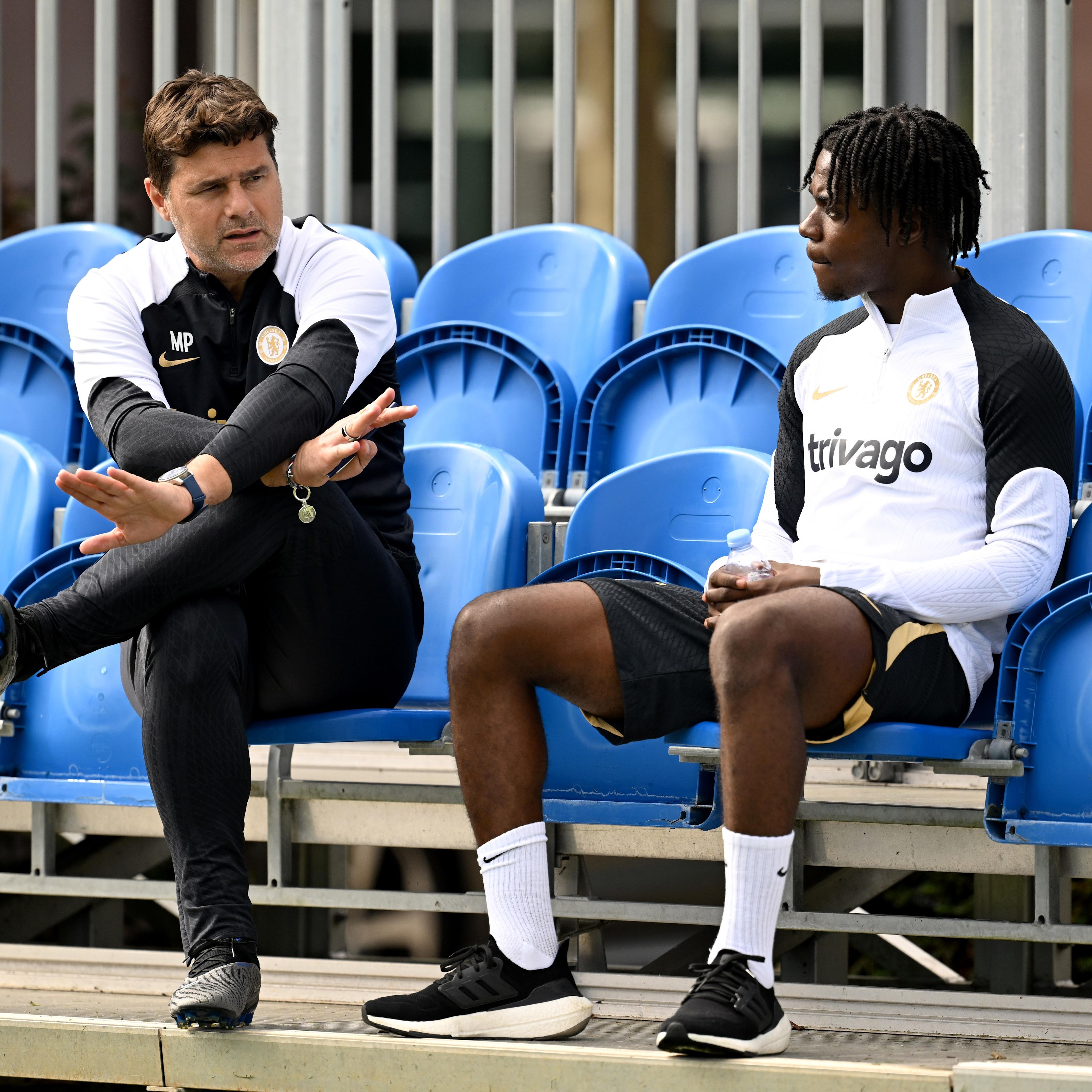 Roméo Lavia talks with Mauricio Pochettino during his first Cobham visit in August 2023