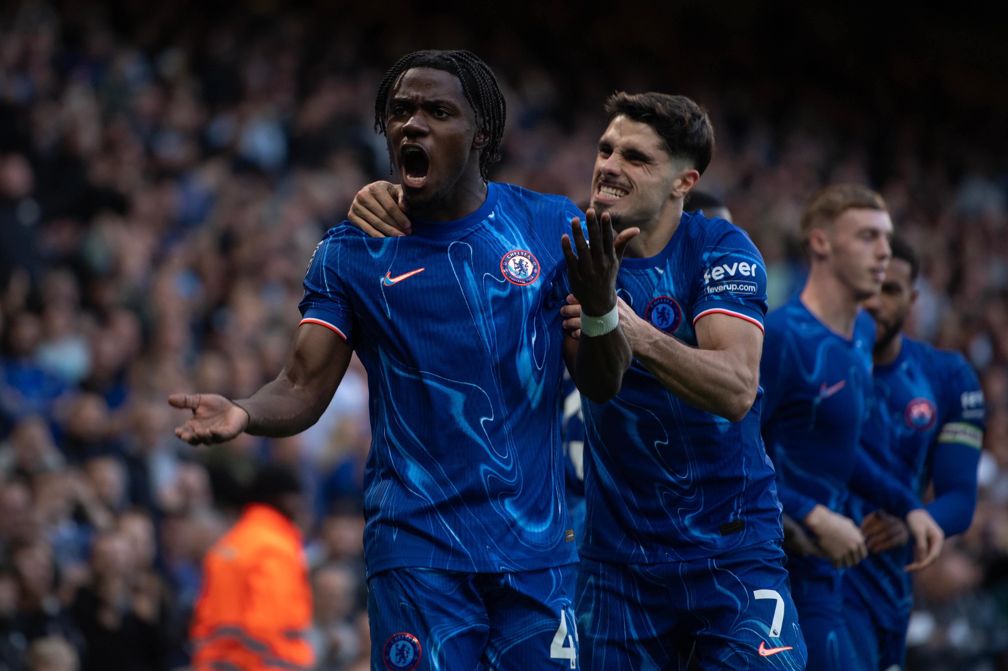 Roméo Lavia celebrates a Chelsea goal with teammates against Newcastle United
