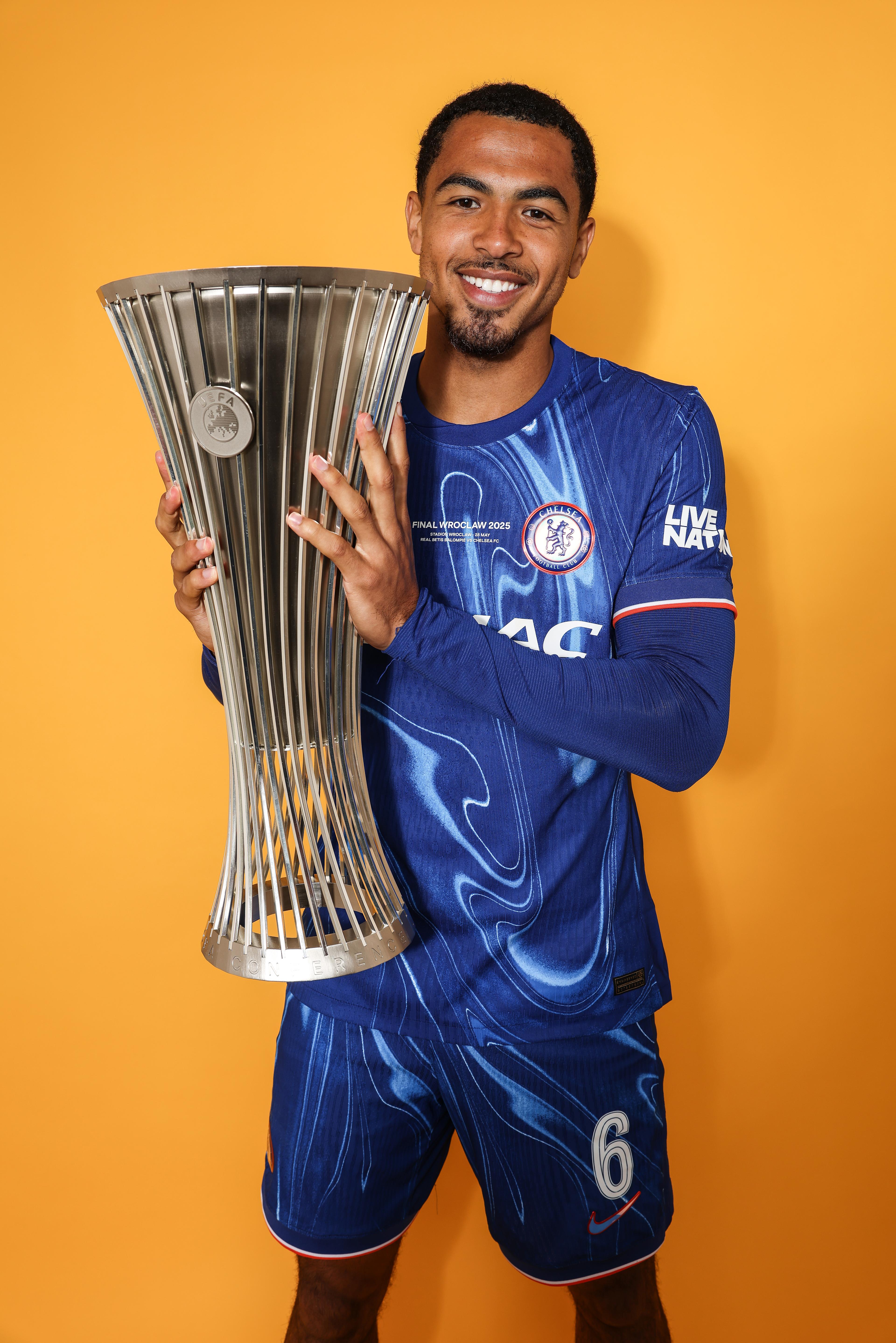 Levi Colwill raises the Conference League trophy after Chelsea's 2025 final win