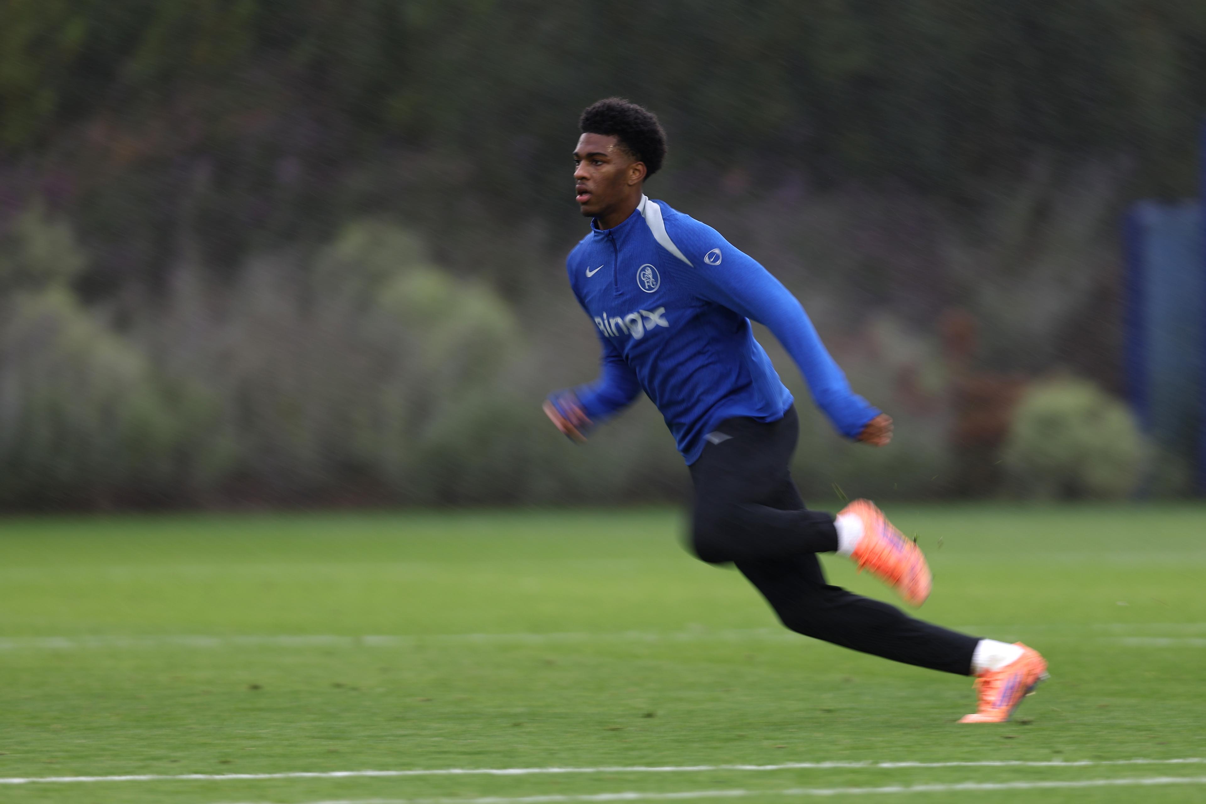 Josh Acheampong controls the ball during first-team training at Cobham