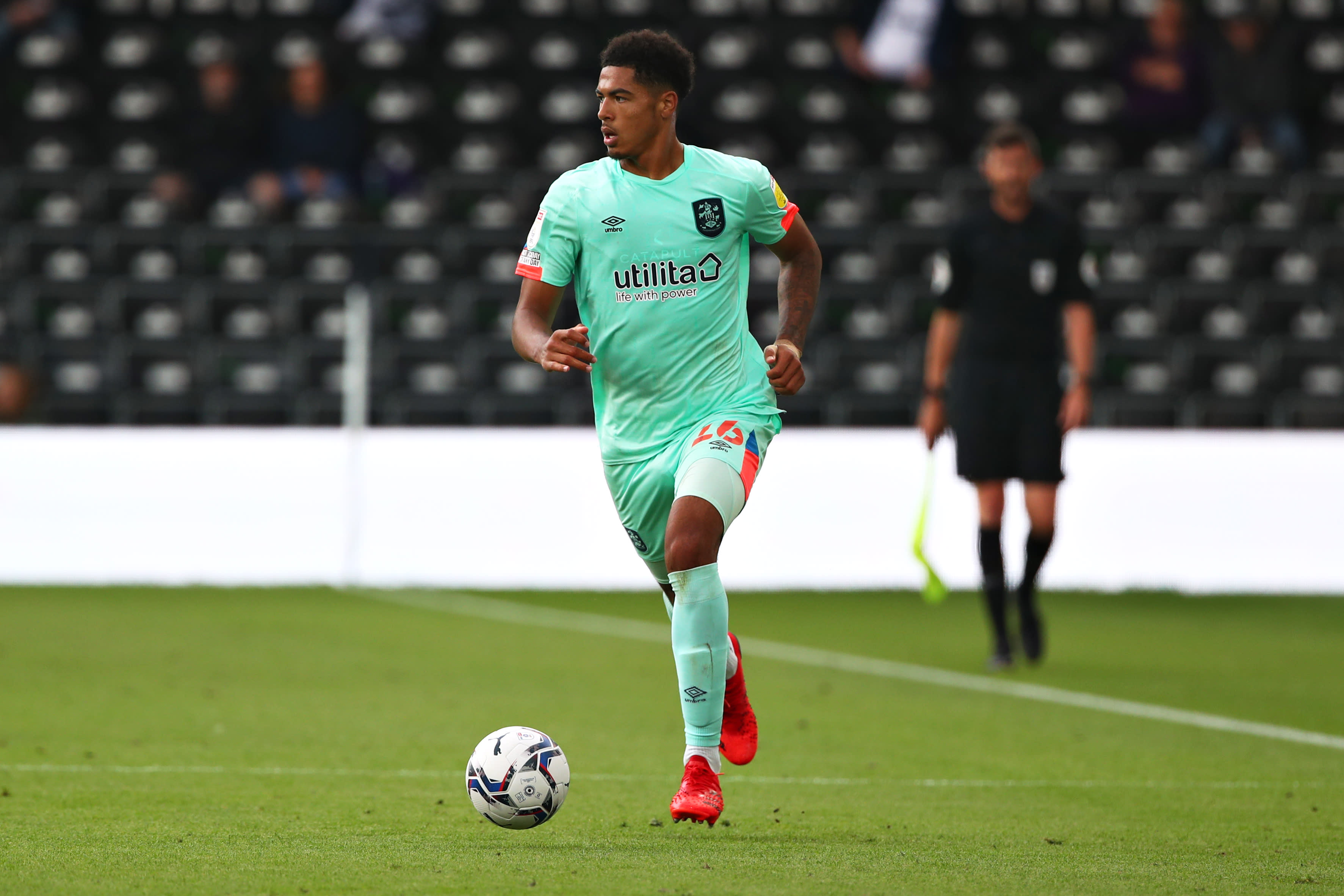 Levi Colwill plays for Huddersfield Town during his Championship loan