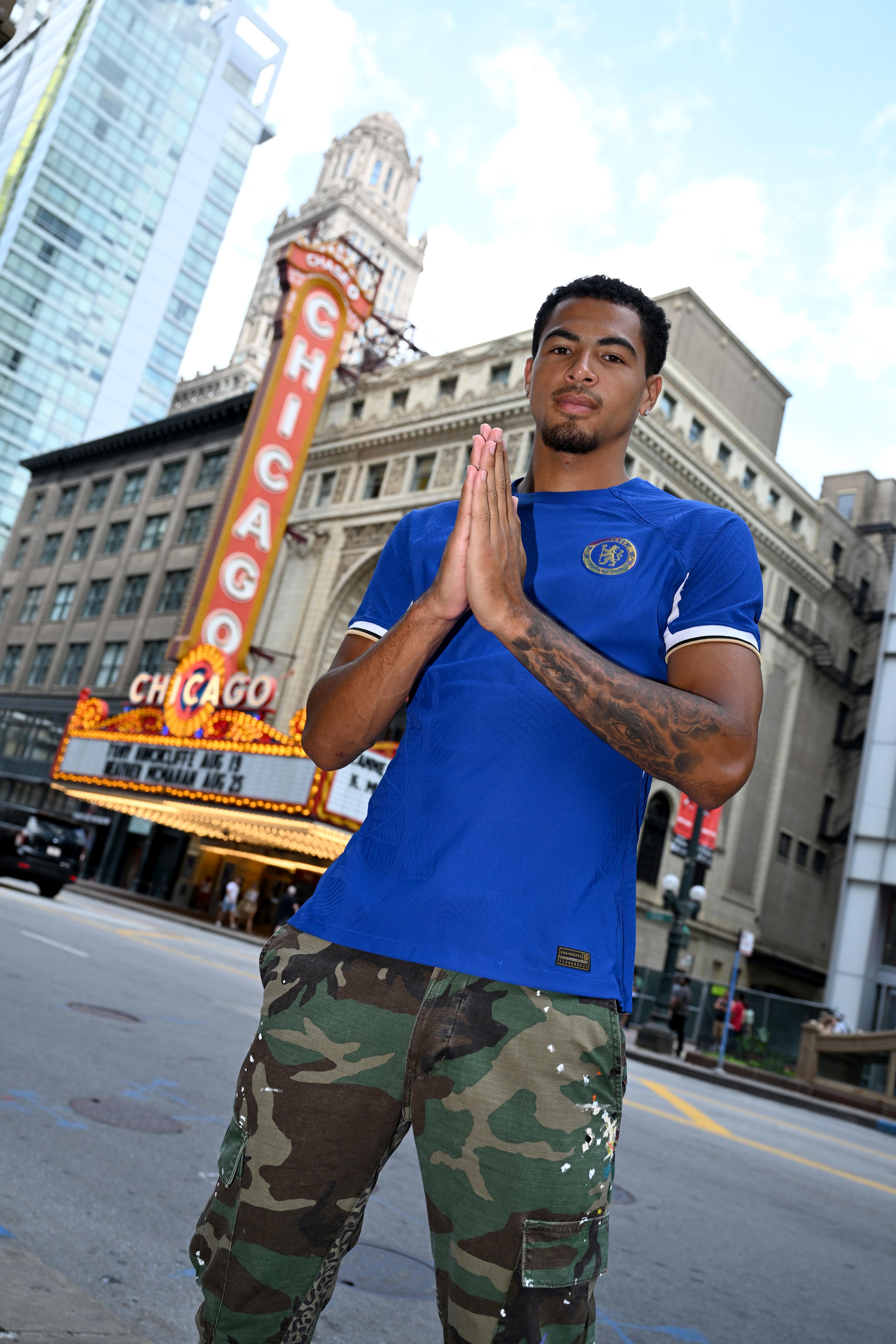 Levi Colwill poses in Chicago after signing a new long-term Chelsea contract in 2023