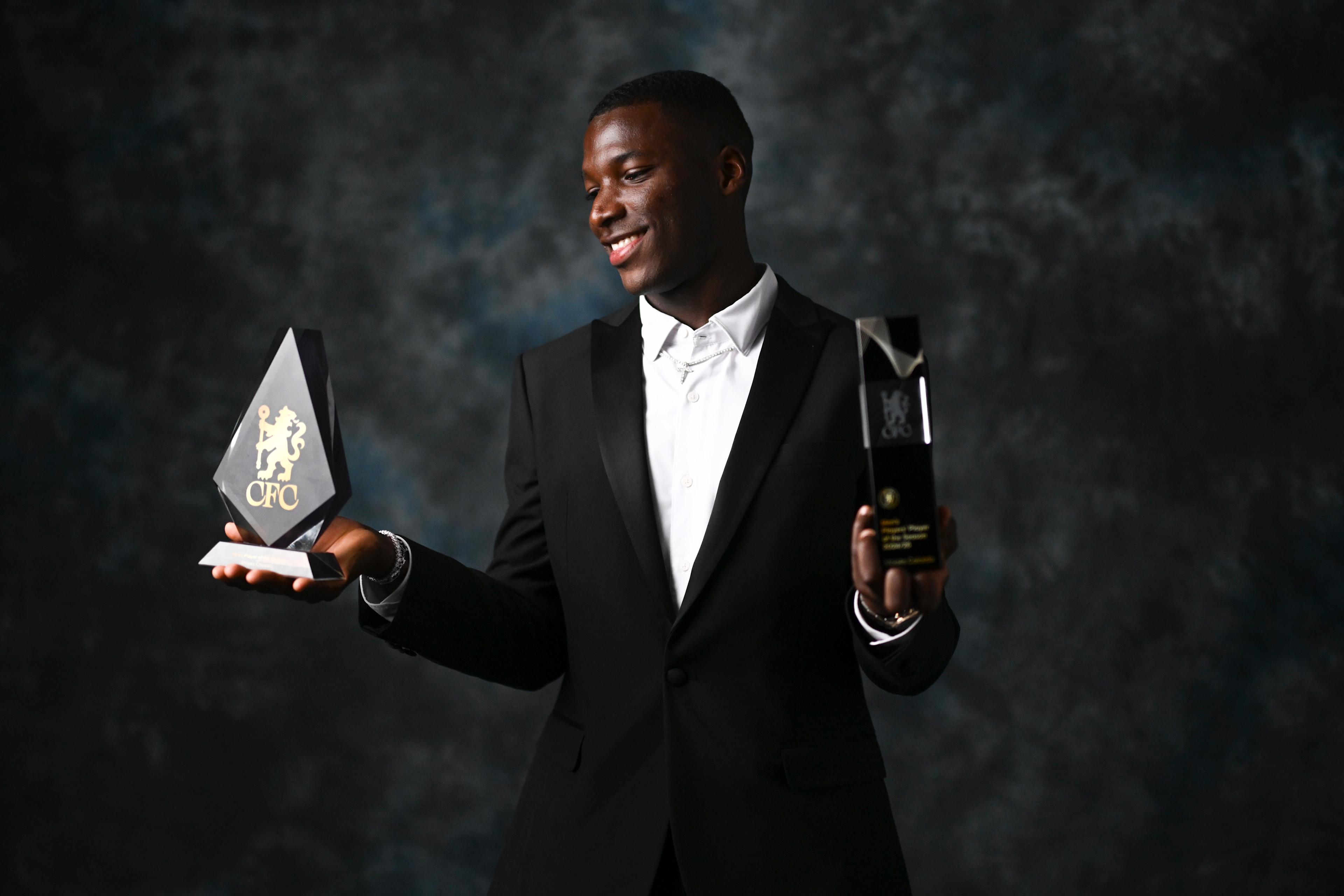 Moisés Caicedo poses with Chelsea's 2024/25 Player of the Year awards