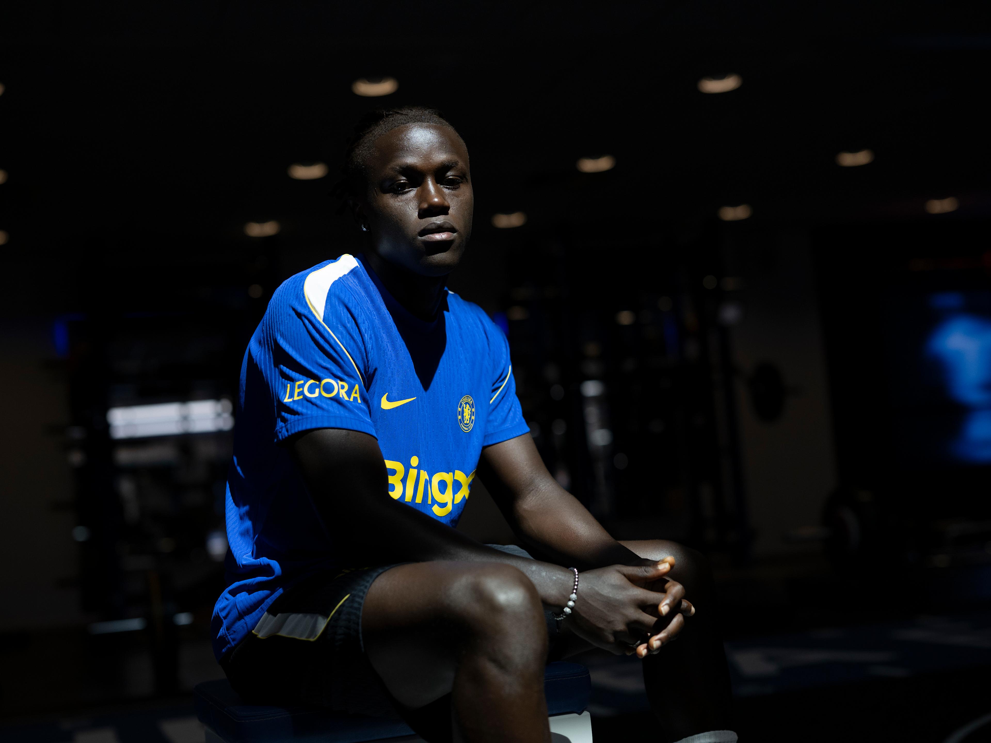 Geovany Quenda poses at Cobham on his first day as a Chelsea player