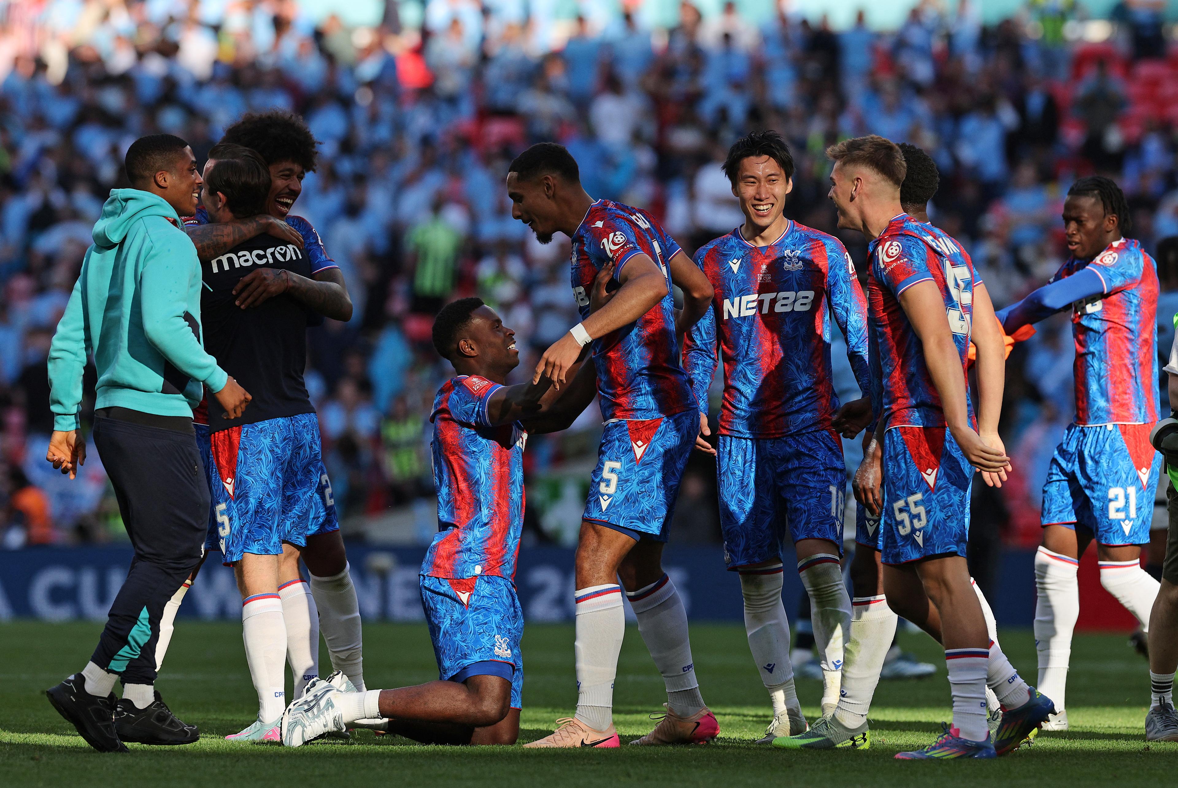 Maxence Lacroix celebrates Crystal Palace's 2025 FA Cup triumph with the trophy