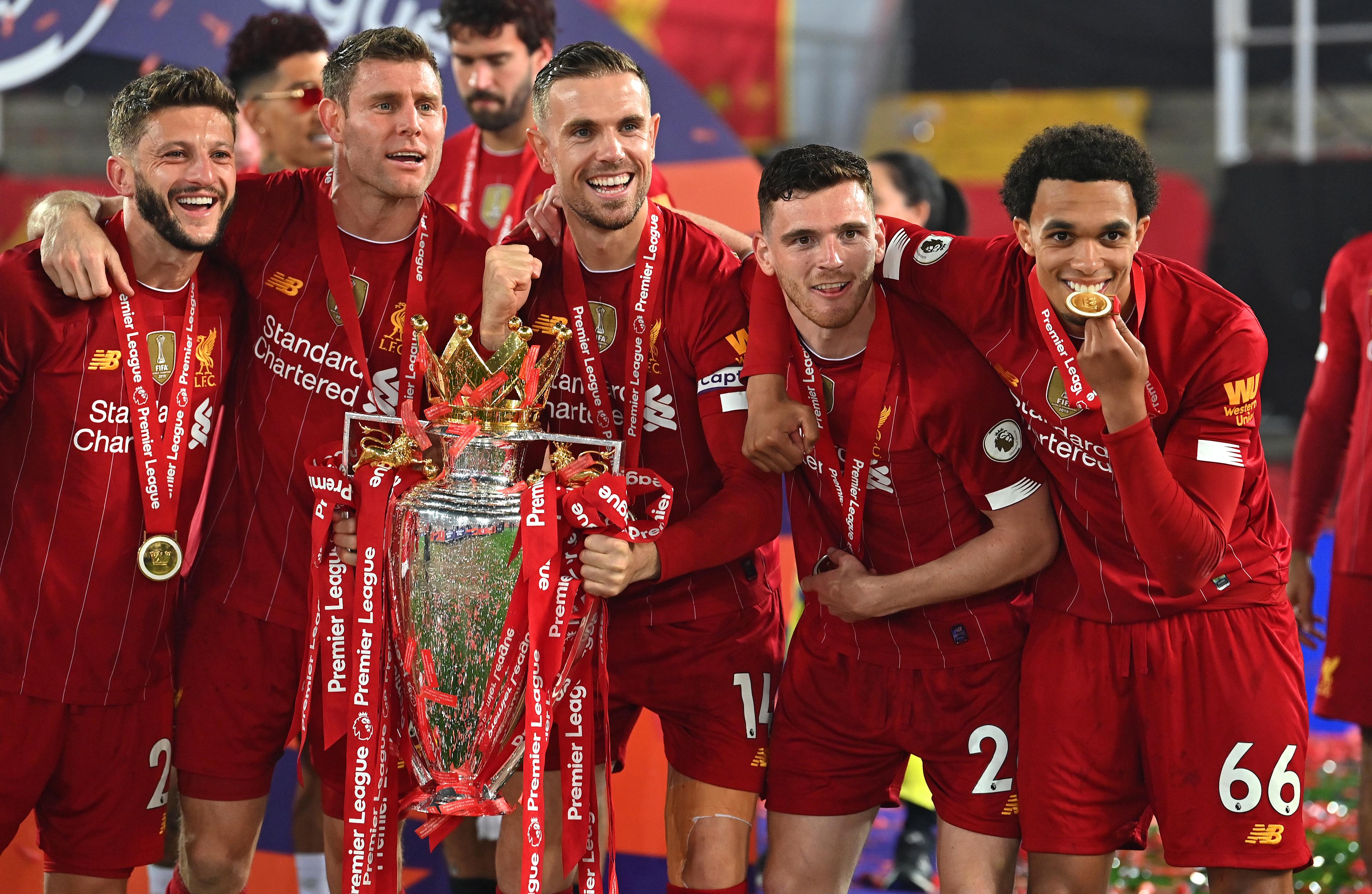 Jordan Henderson celebrates Liverpool's 2019/20 Premier League title