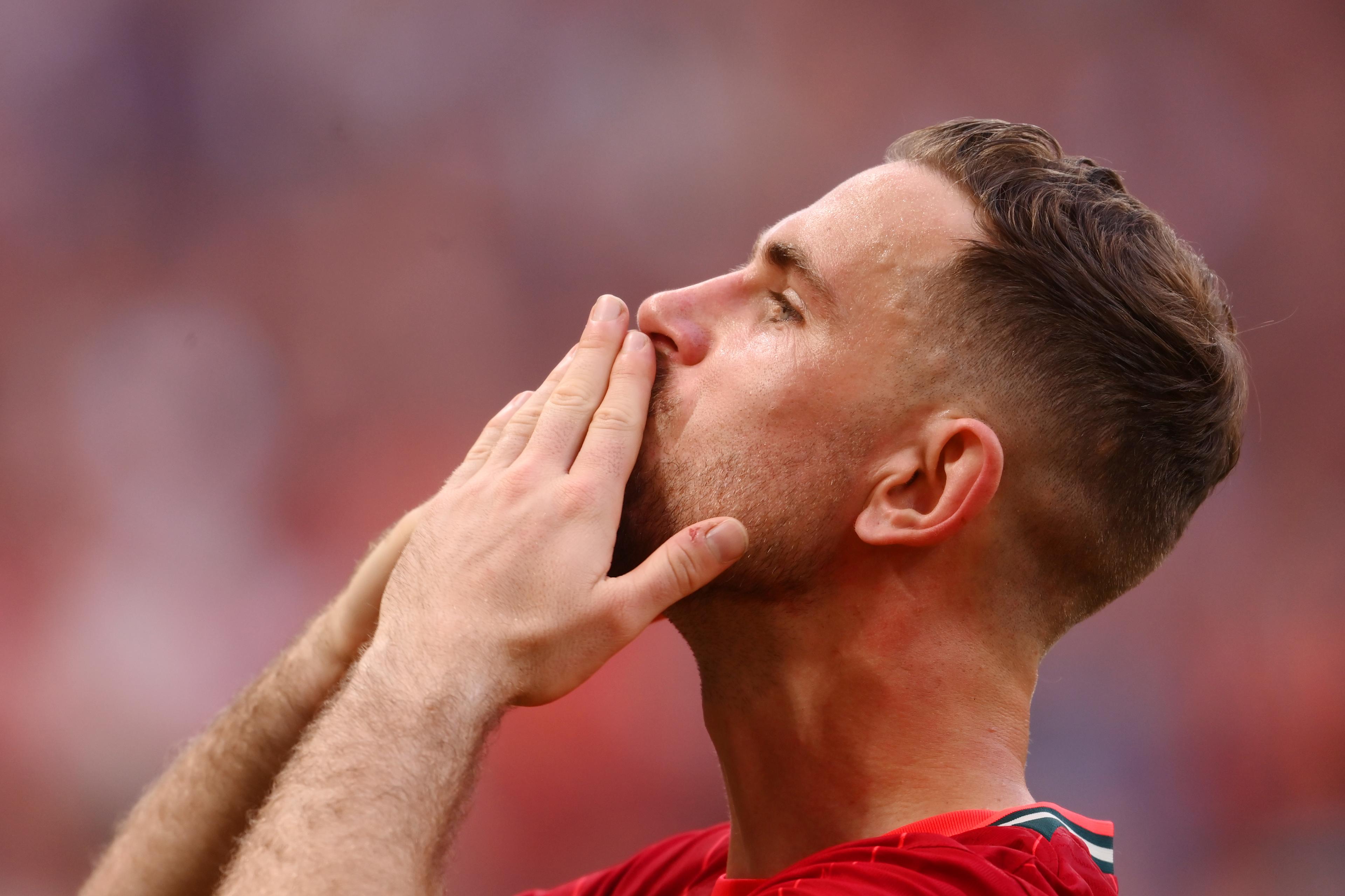 Jordan Henderson celebrates Liverpool's 2022 FA Cup final victory