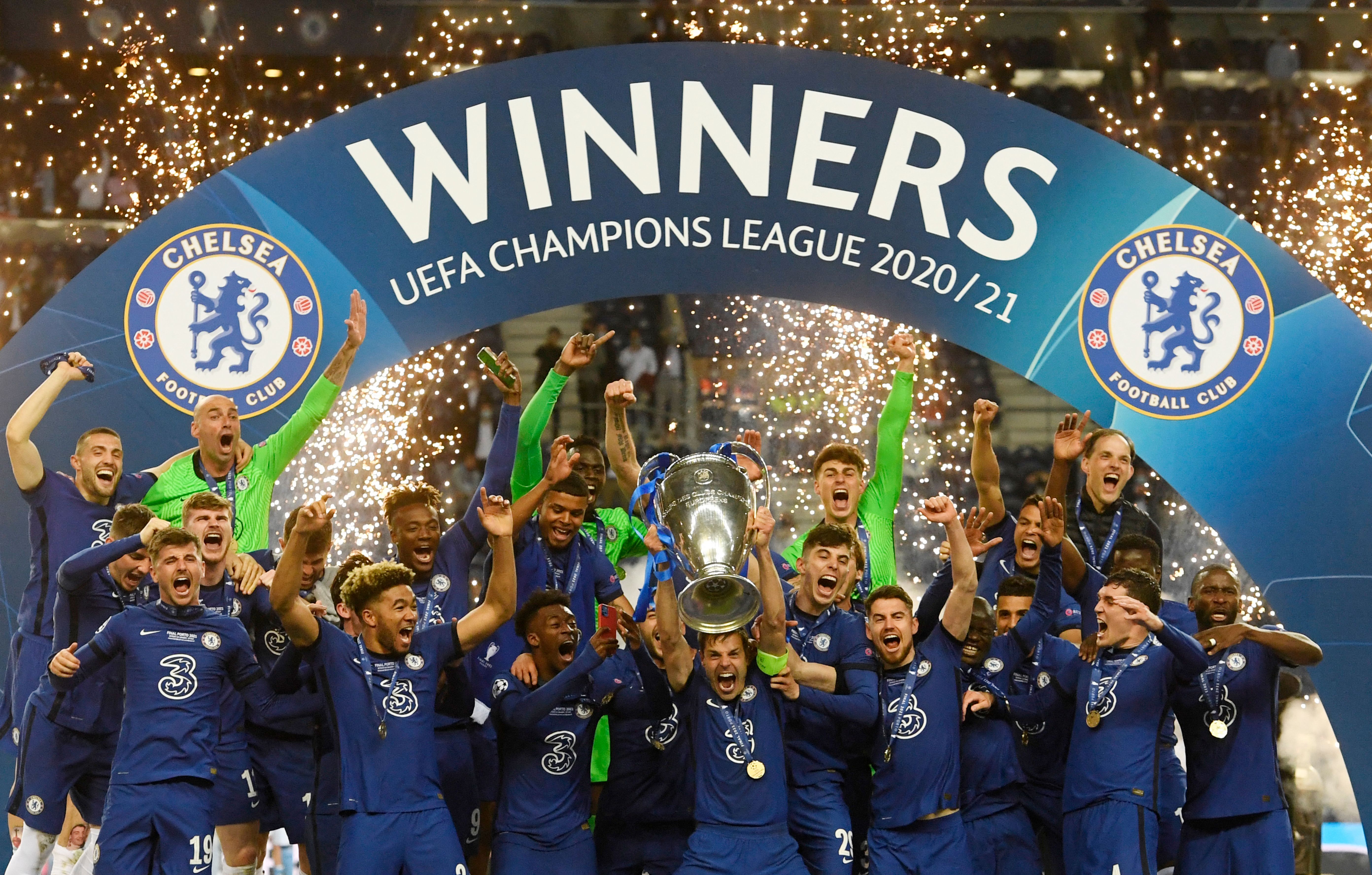 Porto players celebrate as they lift the trophy after beating