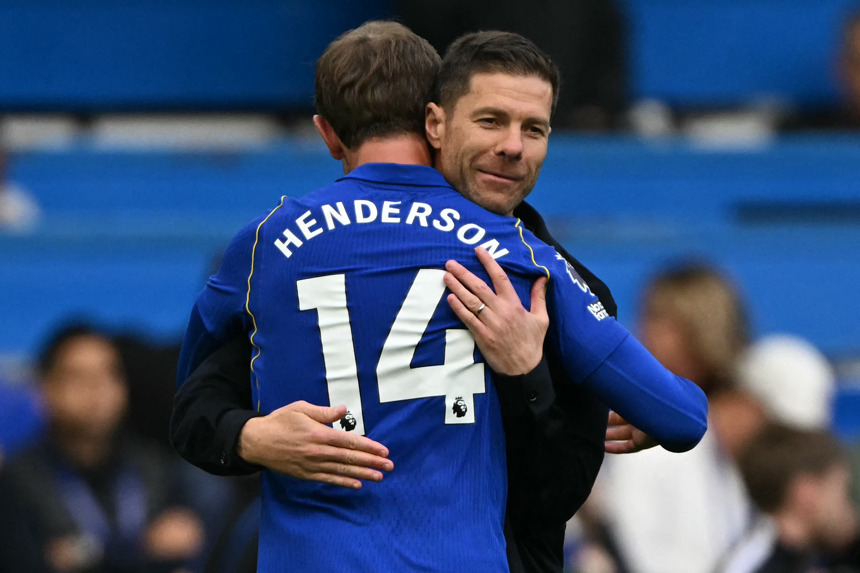 Xabi Alonso embraces Jordan Henderson following our victory over the Cherries