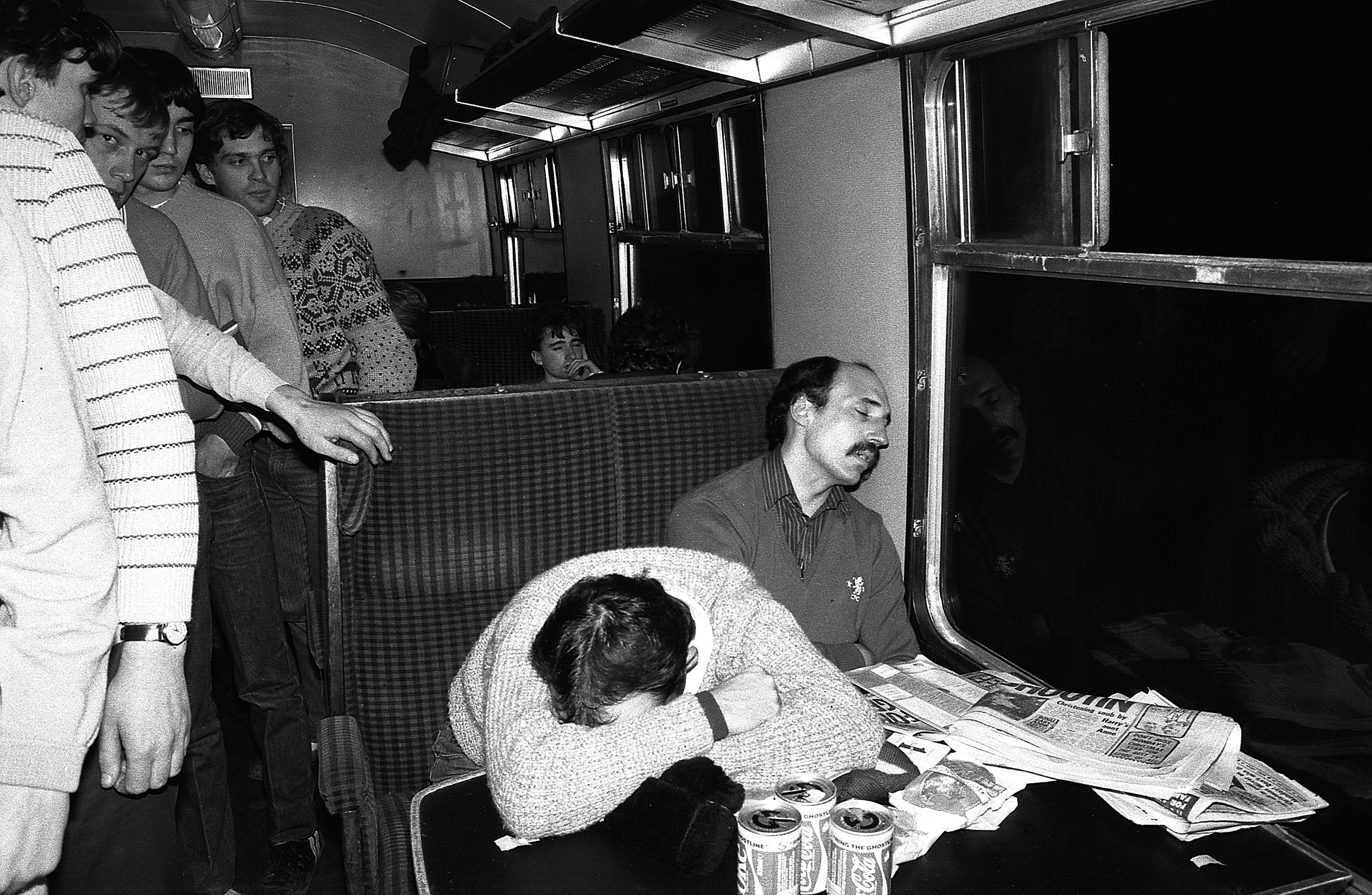 Weary but happy Chelsea fans returning home on the football special train
