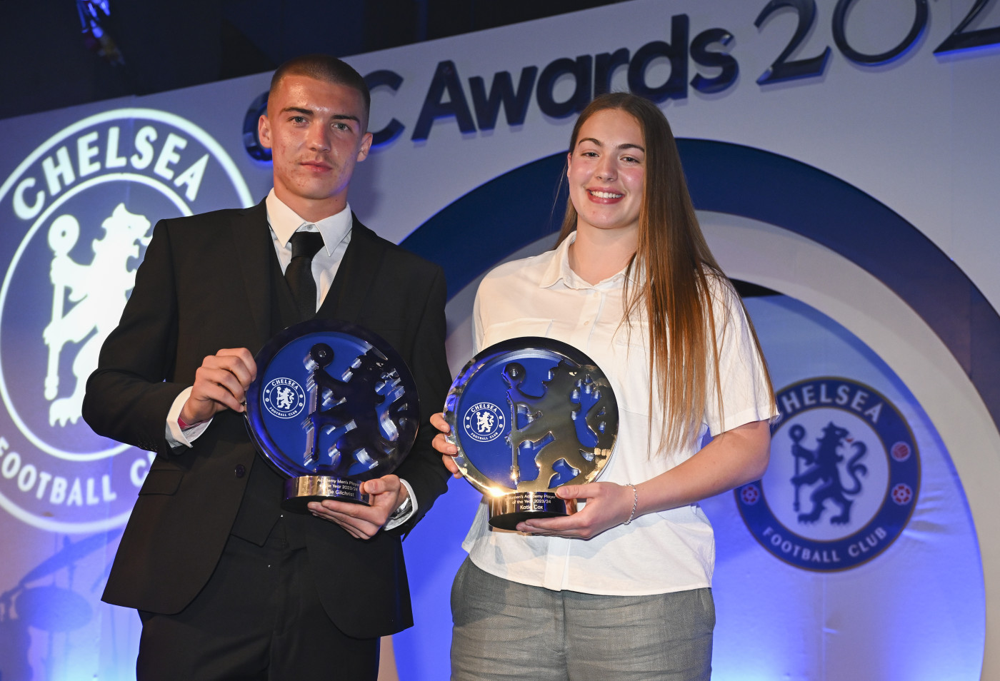 Gilchrist and Cox collecting their awards for Men and Women's Academy Players of the Season respectively