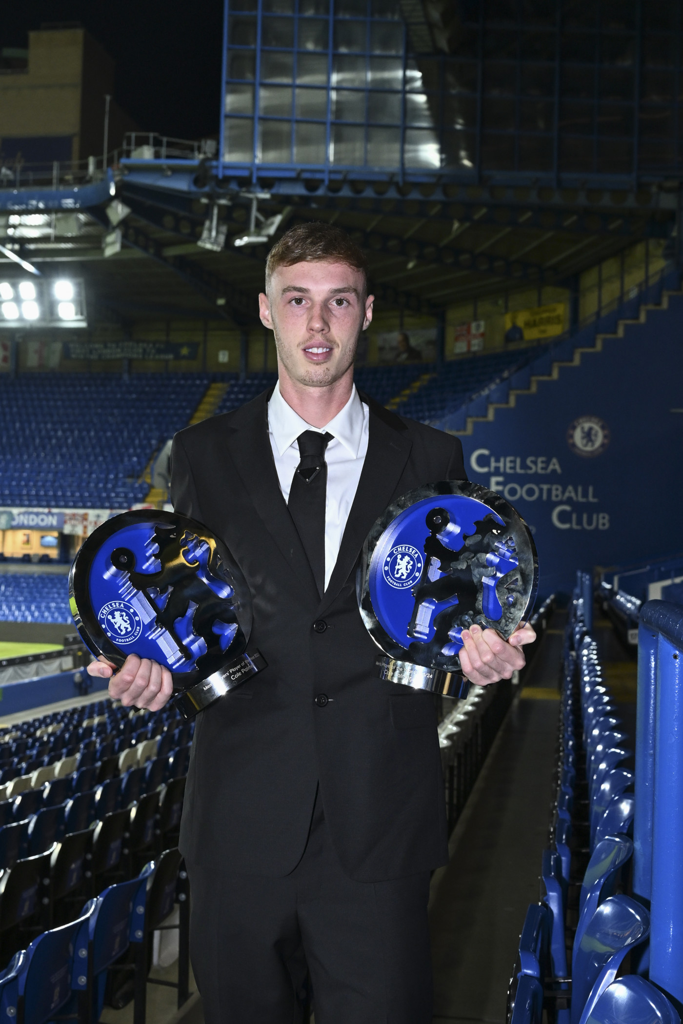 Cole with both his awards, the Men's Players' Player of the Season award and the Men's Player of the Season award