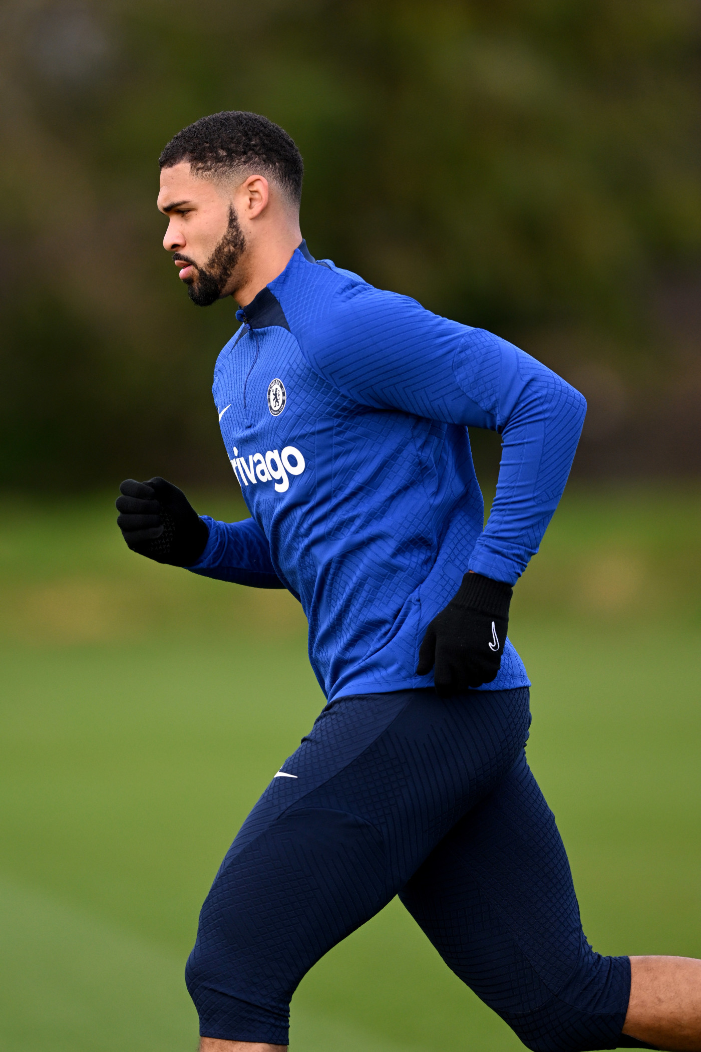 Football Trainer hand in a Pocket