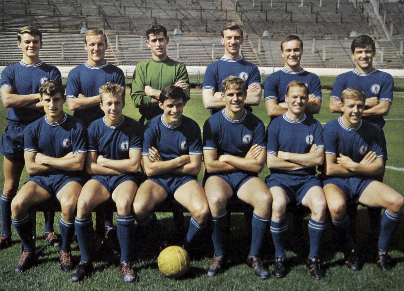 Bobby Tambling sitting in front of Peter Bonetti in 1962