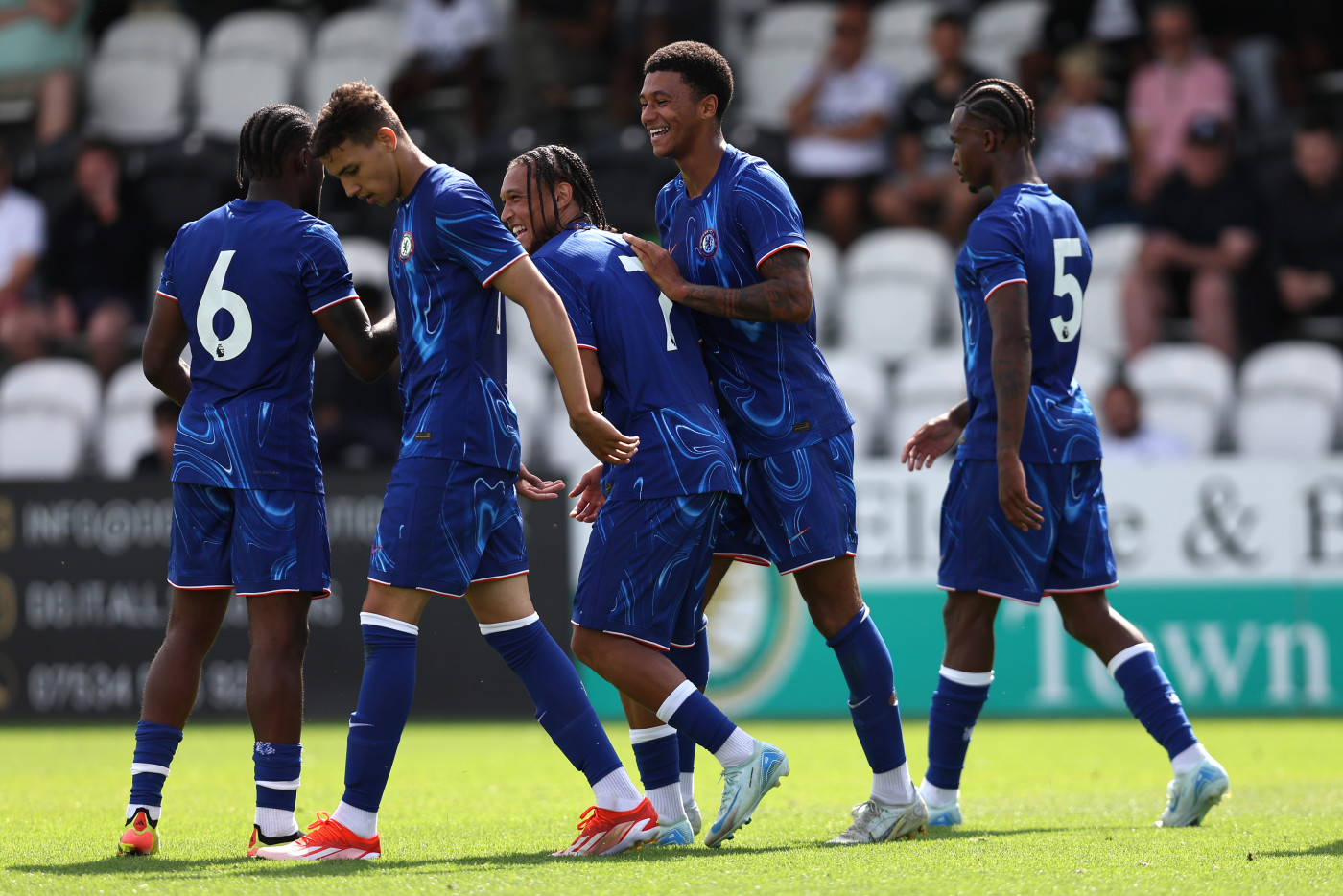 Diego Moreira celebrates his goal at Boreham Wood with his team-mates