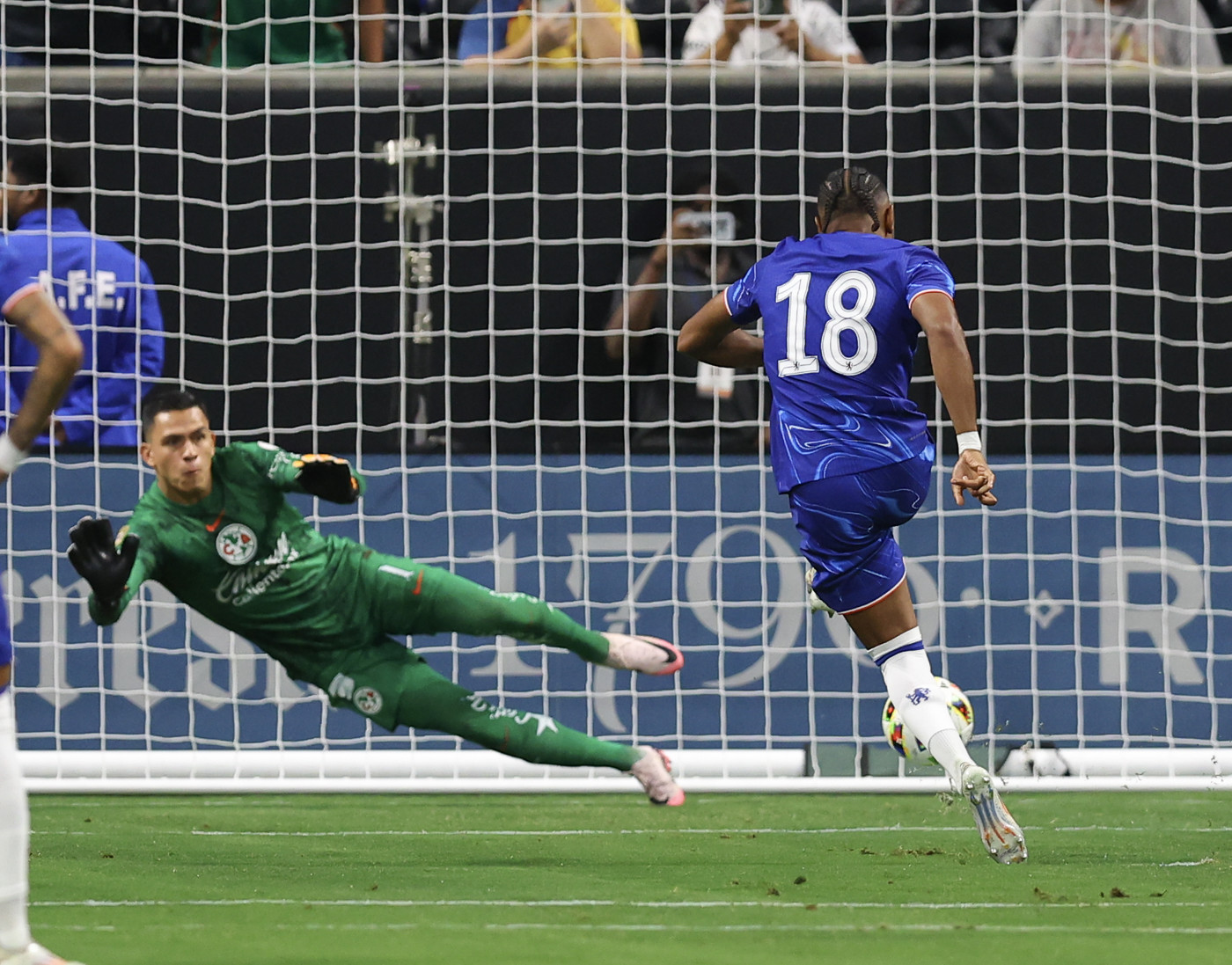 Christopher Nkunku taking a penalty for Chelsea.