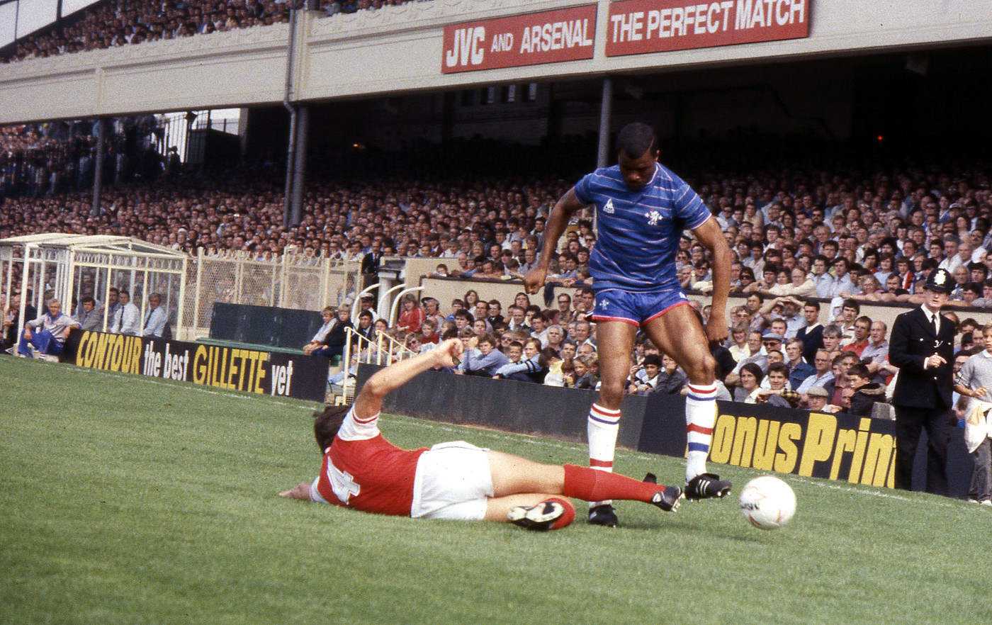 Paul Canoville taking on Arsenal in 1984