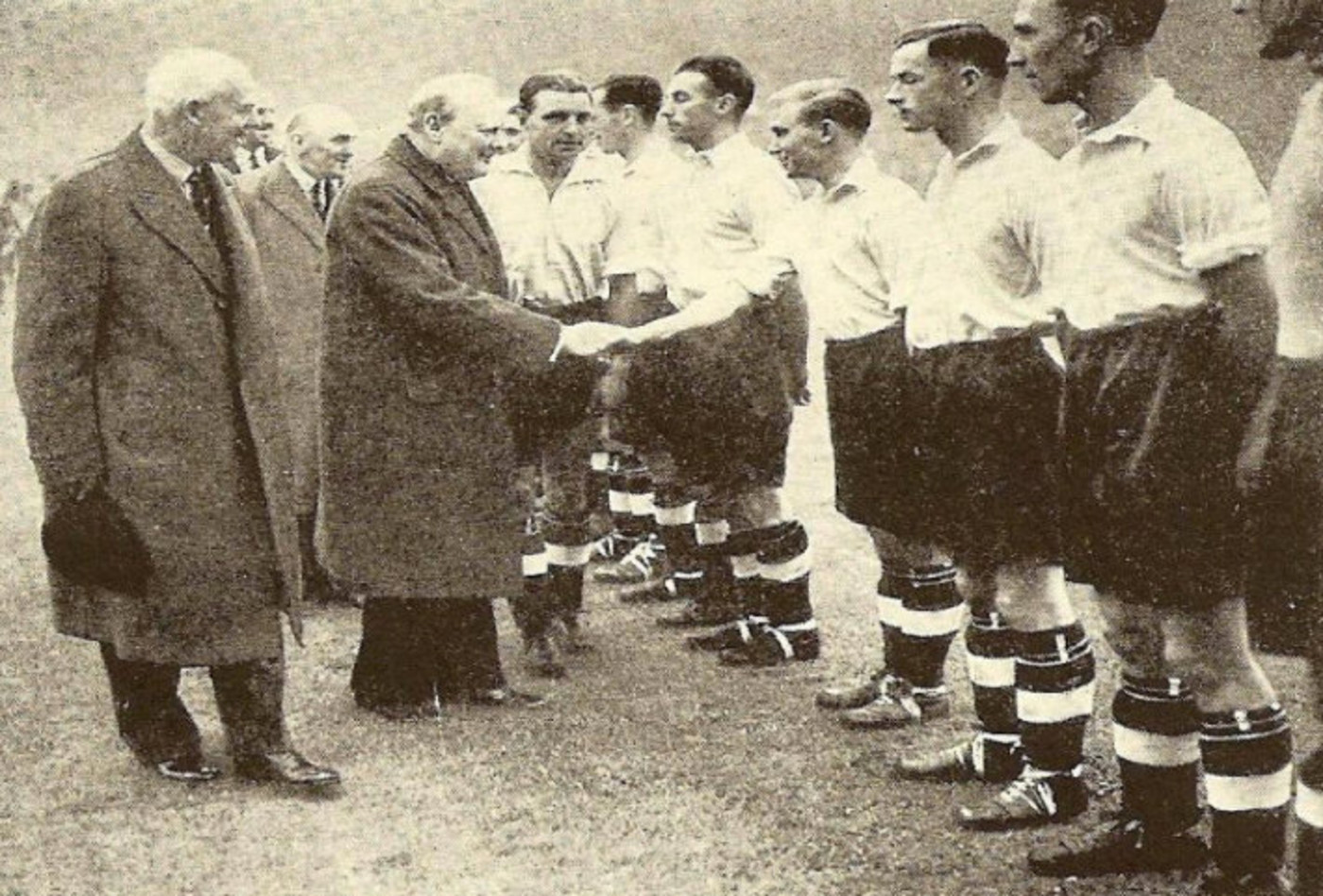 Winston Churchill meeting England players before a game in 1941