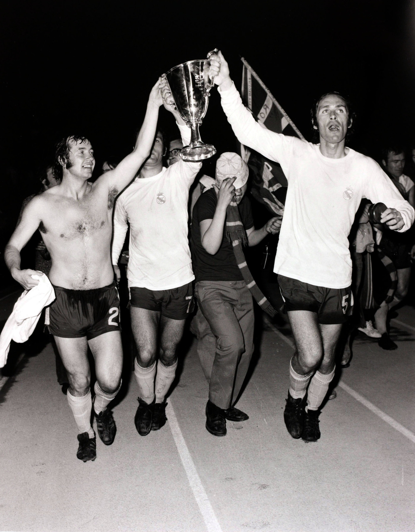 Boyle celebrates with team-mate John Dempsey following the Cup Winners' Cup victory over Real Madrid in Athens in 1971