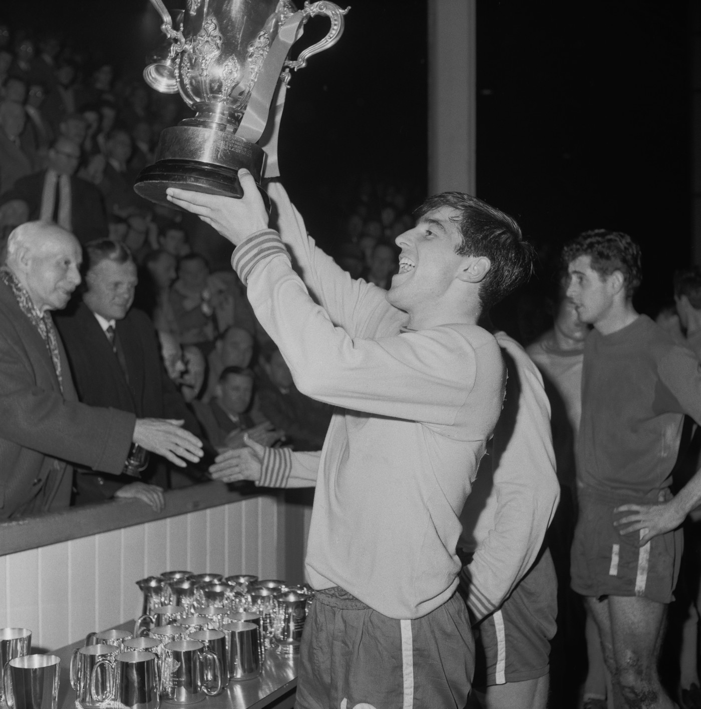 Captain Terry Venables lifts the League Cup at Filbert Street