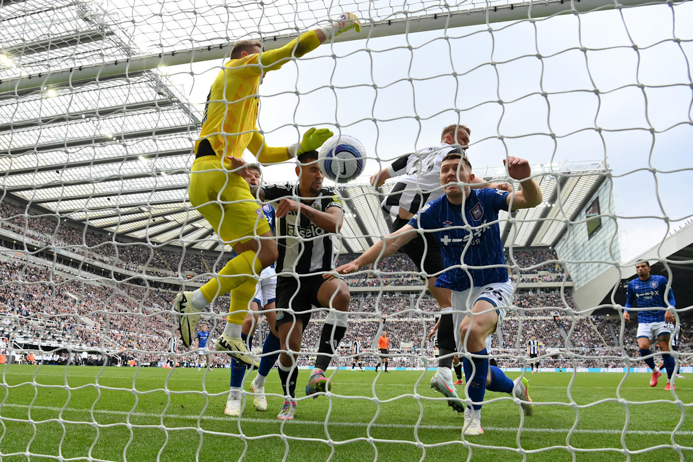 Dan Burn scores in Newcastle's most recent home game, a 3-0 win against 10-man Ipswich