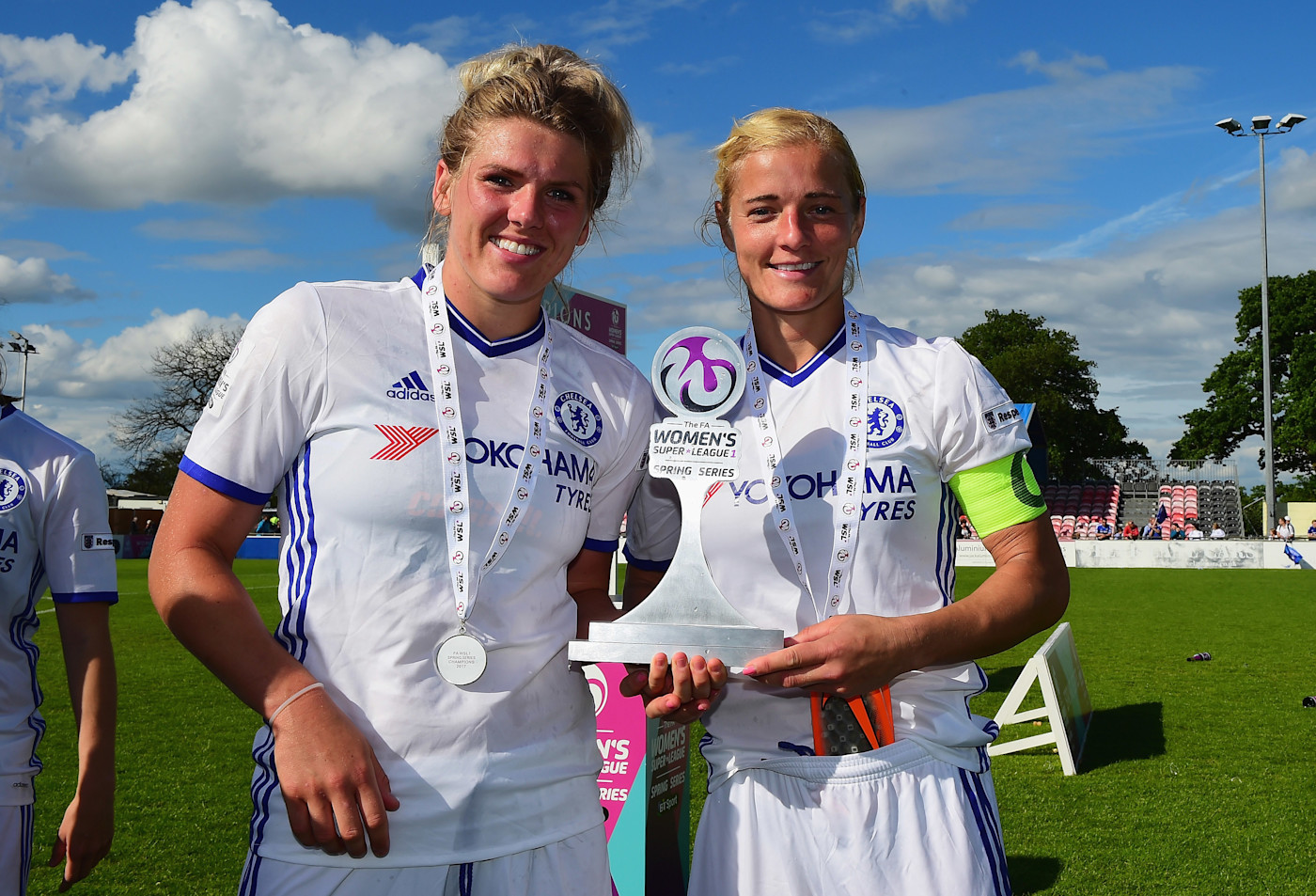 Millie Bright with Katie Chapman after winning the Spring Series with Chelsea in 2017
