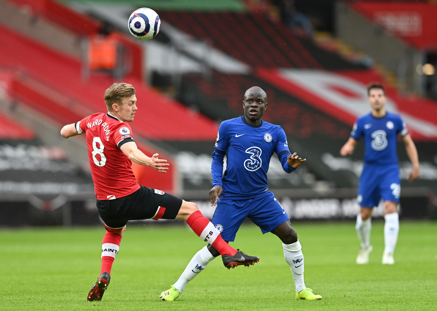 Chelsea midfielder N'Golo Kante stops for a chat and a photo with